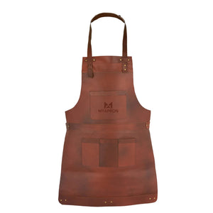 Close-up of logo engraving on waxed brown leather
