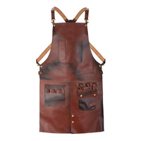 Utility pockets and reinforced rivets on a waxed brown leather work apron
